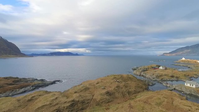 Aerial view from Fl&radic;&bull;v&radic;&para;r out the horizon. Sheep, waves.