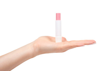 Hand with pink balm lipstick, lips care and beauty