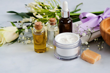 Spa natural skin care products background, cosmetic products - cream, oil and soap creative layout on white background