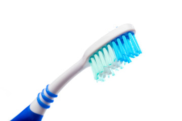 colored toothbrush on an isolated background, close up