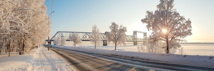 Arkhangelsk. Sunny winter day. January. Railway bridge