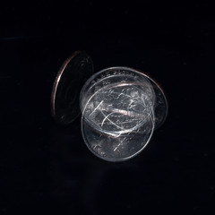 Spinning coin in stroboscopic light