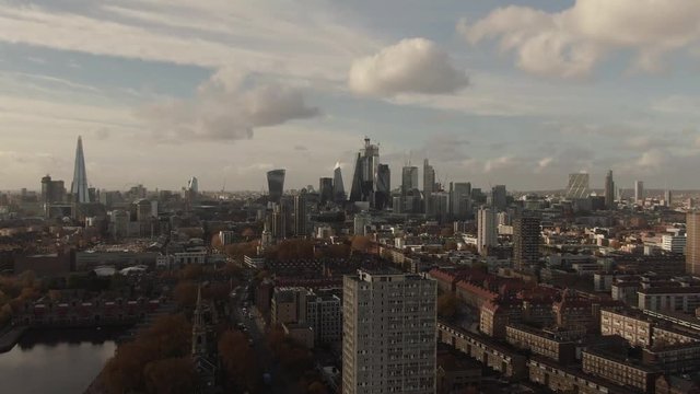 Aerial zoom in view of the skyline of central London from the East