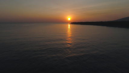 aerial view sunrise over ocean. seascape colorful sunrise over sea at tropical resort