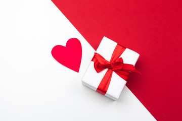 Gift box, red paper hearts . Valentine's Day absctract. Symbol of love. Copy space, flat lay