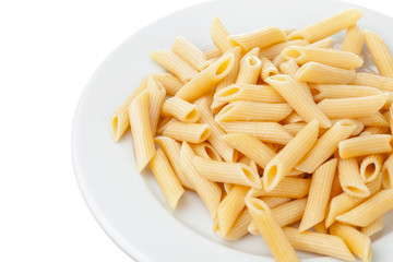 Penne rigate in porcelain bowl isolated on white background
