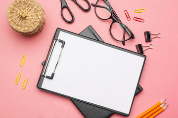 Blank clipboard paper on pink pastel background, copy space
