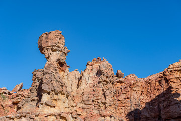Fototapeta na wymiar Rock formation, resembling a human head at the Stadsaal Caves