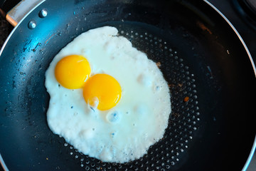 Two Fried Eggs in frying pan