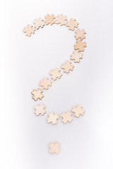 Question mark made from puzzle pieces on white background - 246123666