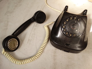 Old Black Phone with a Number Dial