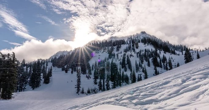 Winter Mountain Resort Run and Chairlift Timelapse with Rolling Clouds 4K 60P