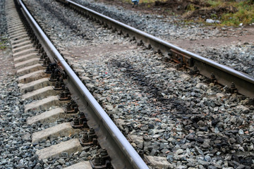 railway in the industrial zone..empty rails with a semaphore, in anticipation of a freight train.