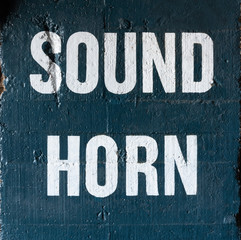 Large sign Sound Horn sign pained on exterior wall