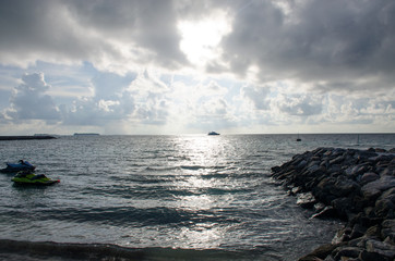 gray sunset on the beach the Indian Ocean the island of Maldives