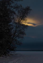 Naklejka na ściany i meble Winter nature landscape with frozen lake and full moon