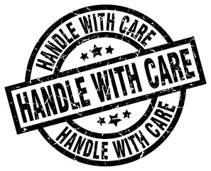 handle with care round grunge black stamp