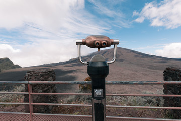 Looking at the Piton de la Fournaise through binoculars in Reunion Island