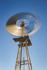 Close up image of a windpump / windpomp / in the great karoo region of south africa