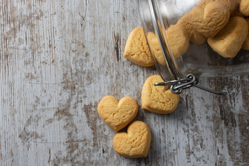 Heart shaped cookies on light rustic background
