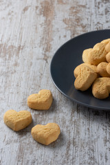 Heart shaped cookies on light rustic background
