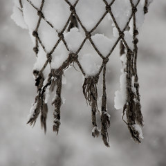 Basketball hoop net with snow. Winter basketball.