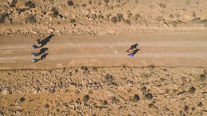 Aerial image of a group of hikers doing a hiking train in the karoo region of south africa © Dewald