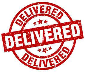 delivered round red grunge stamp