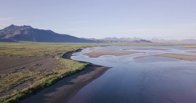 Aerial Footage of River Delt with Birds Flying by During Sunny Summer In Snaefellsness Peninsula, Iceland