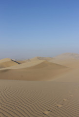 Fototapeta na wymiar peru huacachina sand dune foot steps