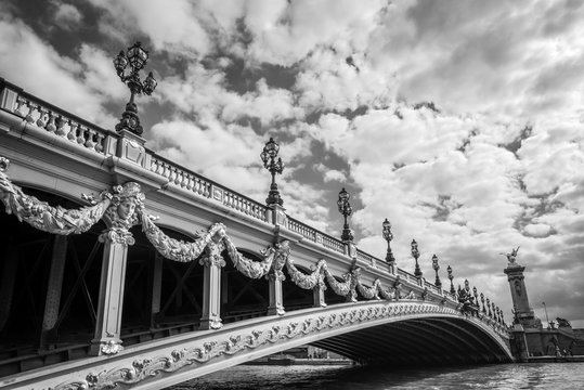 Fototapeta Alexandre III bridge and the river Seine in Paris France, black and white photography