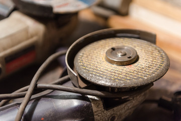 Work tool Bulgarian. Tool in the carpentry workshop on the shelf. Tool for cutting metal.