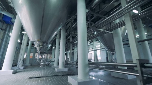 Distillery unit filled with modern equipment 