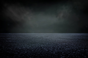 Obraz premium Spotlight concrete on the floor. dark black background