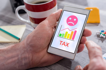Tax increase concept on a smartphone