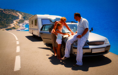Camping RV travel with caravan trailer, summer beach. Happy family on mototorhome vacation. - obrazy, fototapety, plakaty