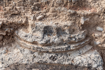 Ground covered the remains of Ionic Column at ancient Olympia, Greece