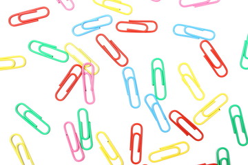Colorful paperclips isolated on a white background, top view