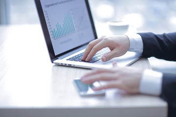 closeup.modern businessman working in the office. photo with copy space.