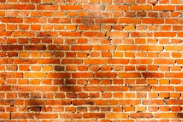Od red brick wall texture background. bricked wall of orange color, wide vintage style.