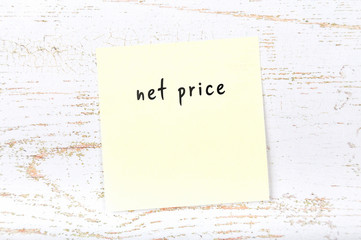 Yellow sticky note with handwritten text net price