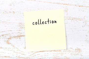 Yellow sticky note with handwritten text collection
