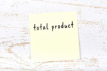 Yellow sticky note with handwritten text total product