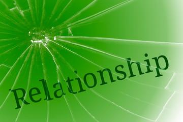 The text relationship on the broken glass. Personal conflict or loneliness concept.