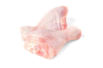 Raw chicken legs isolated on white background.
