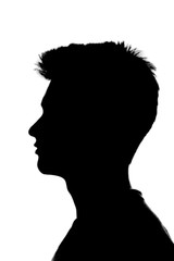 silhouette profile of young man isolated on white background - 246160414