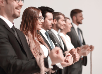 close up.a group of successful business people tied with one rope.