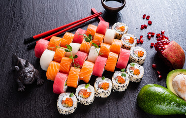 sushi on the black background
