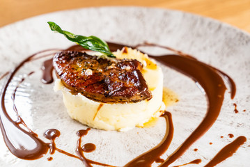 Mashed potato with meat and sauce