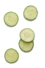 Cucumber slices on white background